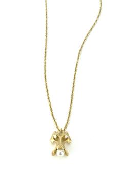 14k gold caudal vertebrae with pearl 1